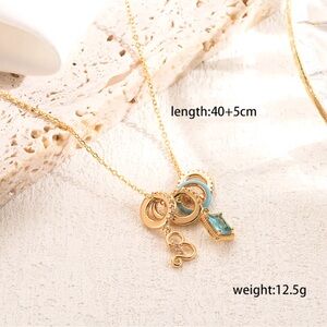 14K Gold Barbie Theme Mismatched Pendants Charms Necklace (Iconic B Blue Gem)